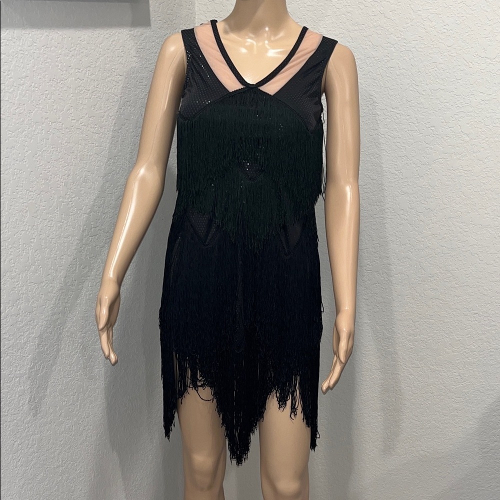 Weissman’s Black Fringe Sleeveless Dress, every move maximized.